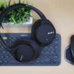 headphones, keyboard and mouse on display in black colour