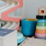 Bright wooden toys on a table, ideal for playful learning and child development.